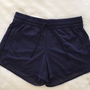 Athleta Navy drawstring shorts w/cutout detail